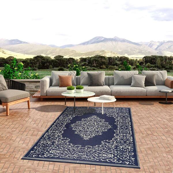 https://images.thdstatic.com/productImages/ef617de9-ff70-4e44-ad70-ab461339076a/svn/blue-white-beverly-rug-outdoor-rugs-hd-odr20746-8x10-e1_600.jpg