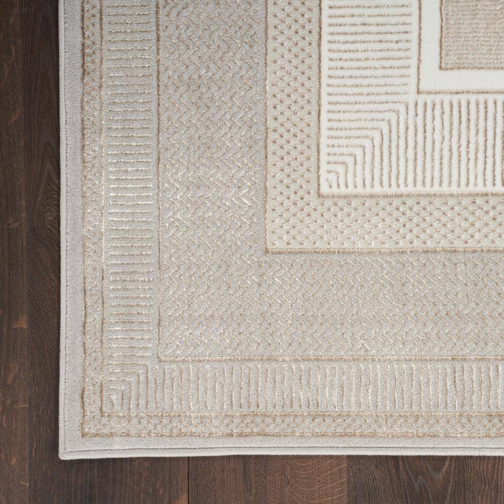 Ivory Geometric Abstract 5' x 7' Easy-Care Synthetic Area Rug