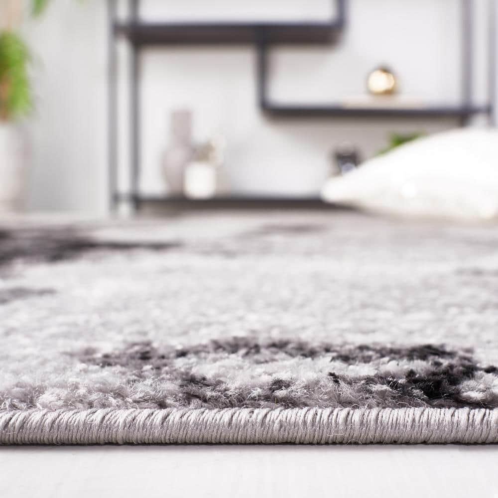 8' x 8' Grey and Black Abstract Synthetic Area Rug