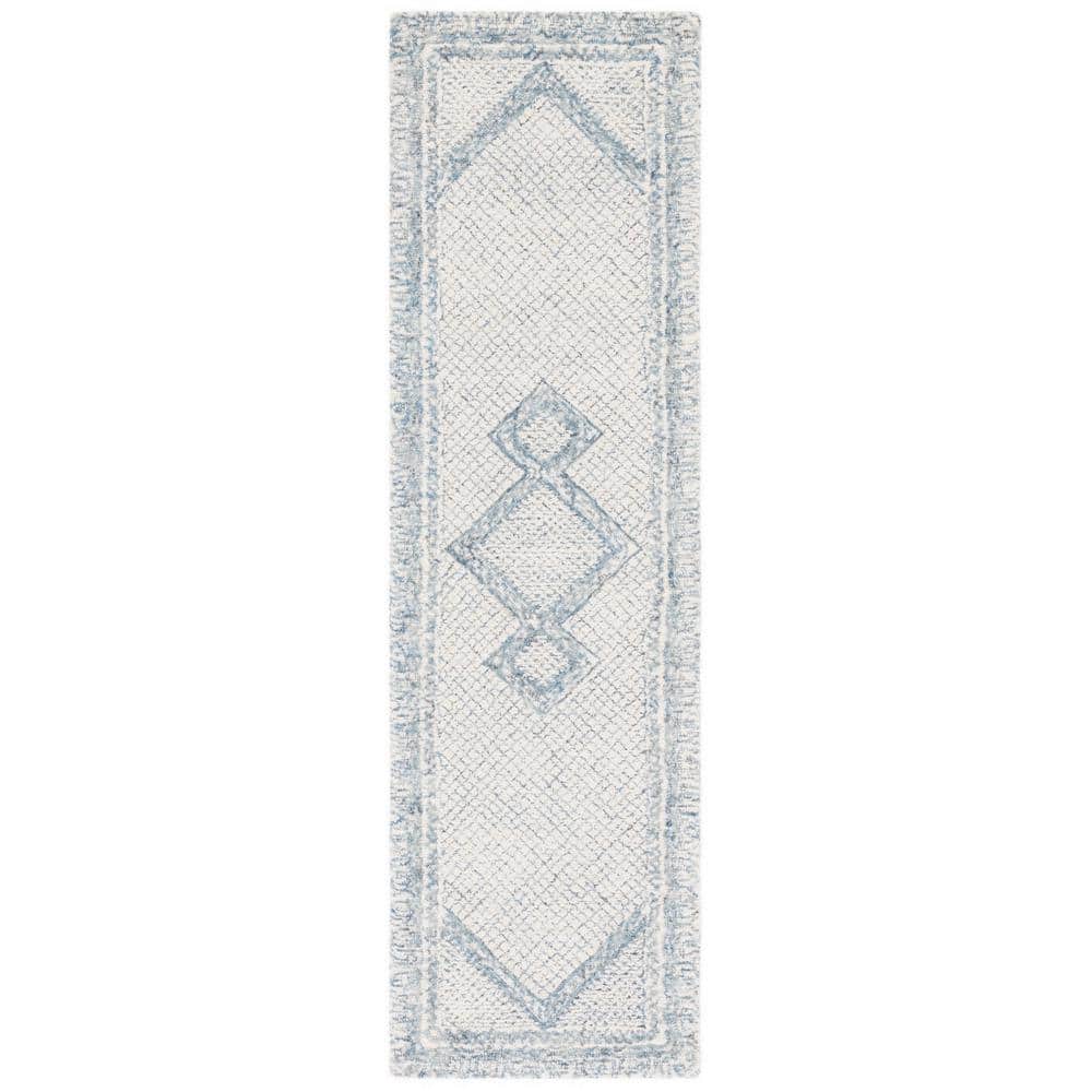 Handmade Blue and Ivory Wool Abstract Tufted Rug