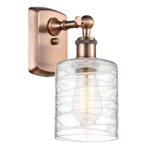 Cobbleskill 1-Light Antique Copper Wall Sconce with Deco Swirl Glass Shade