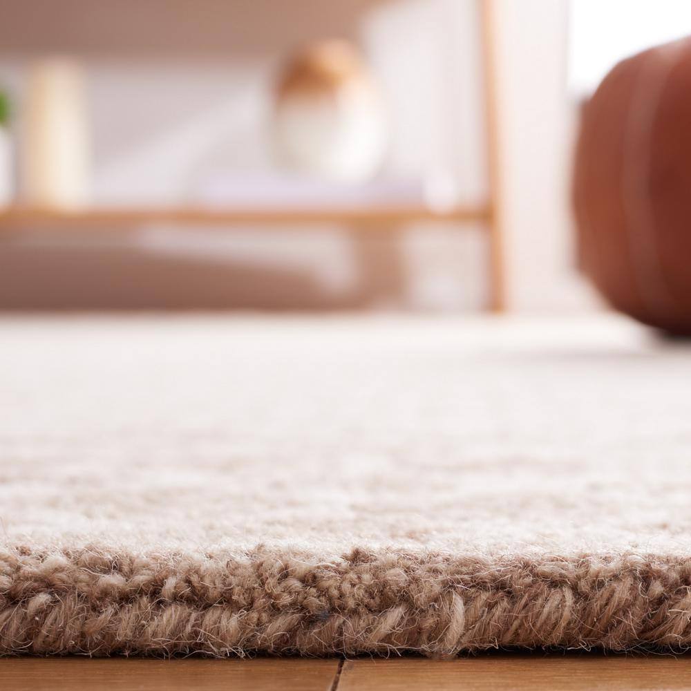 Ivory and Brown Handmade Abstract Wool Area Rug