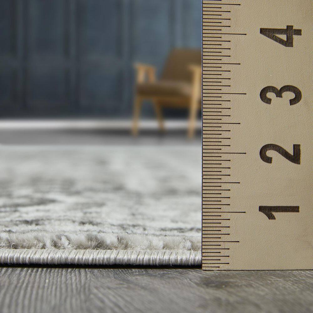 Ivory and Gray 9' x 12' Synthetic Oriental Rug