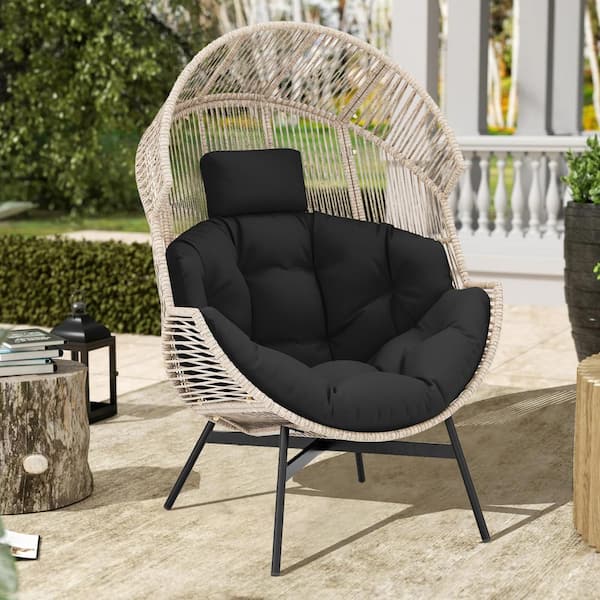 Liviza Wicker Outdoor Lounge Chair with Black Cushions