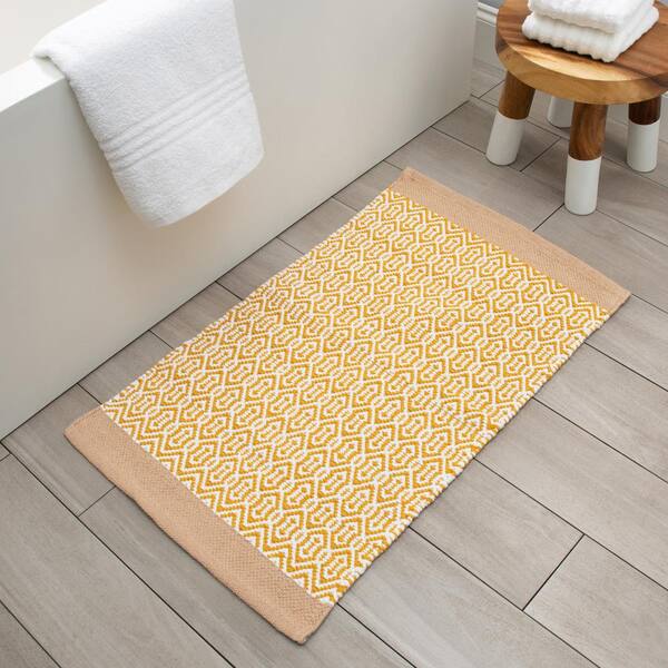 https://images.thdstatic.com/productImages/efe289cb-807a-486a-aaed-a18926300971/svn/yellow-bathroom-rugs-bath-mats-456100-yel-c3_600.jpg