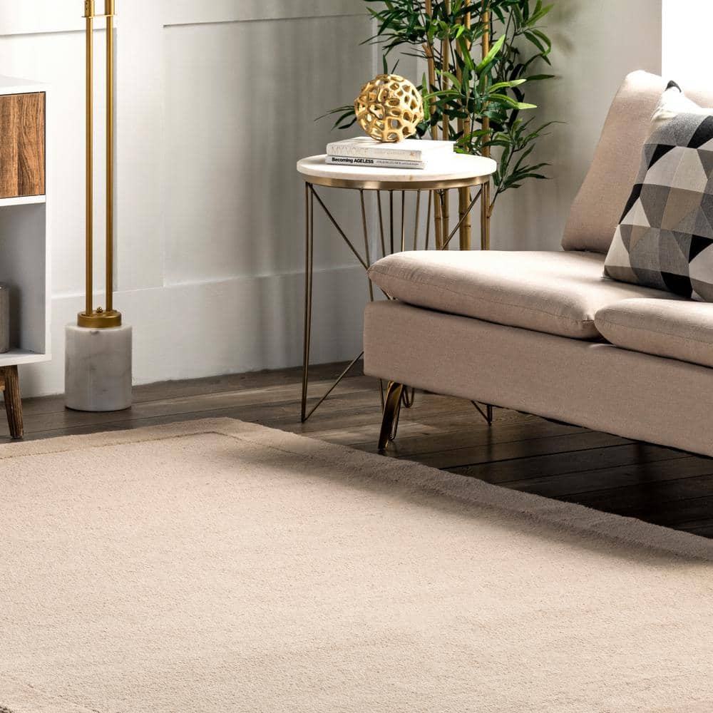 Beige Handmade Wool 4' x 6' Tufted Area Rug