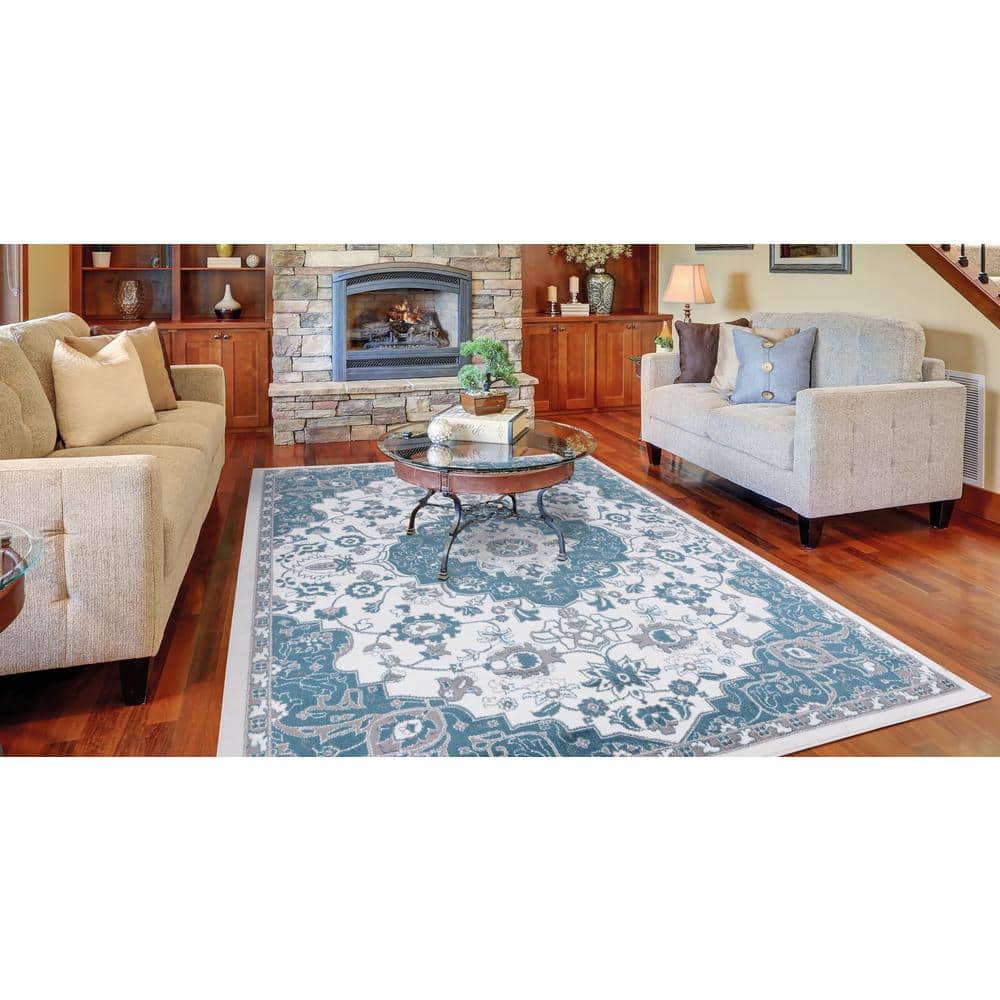 Ivory and Blue Medallion Synthetic 8' x 10' Area Rug