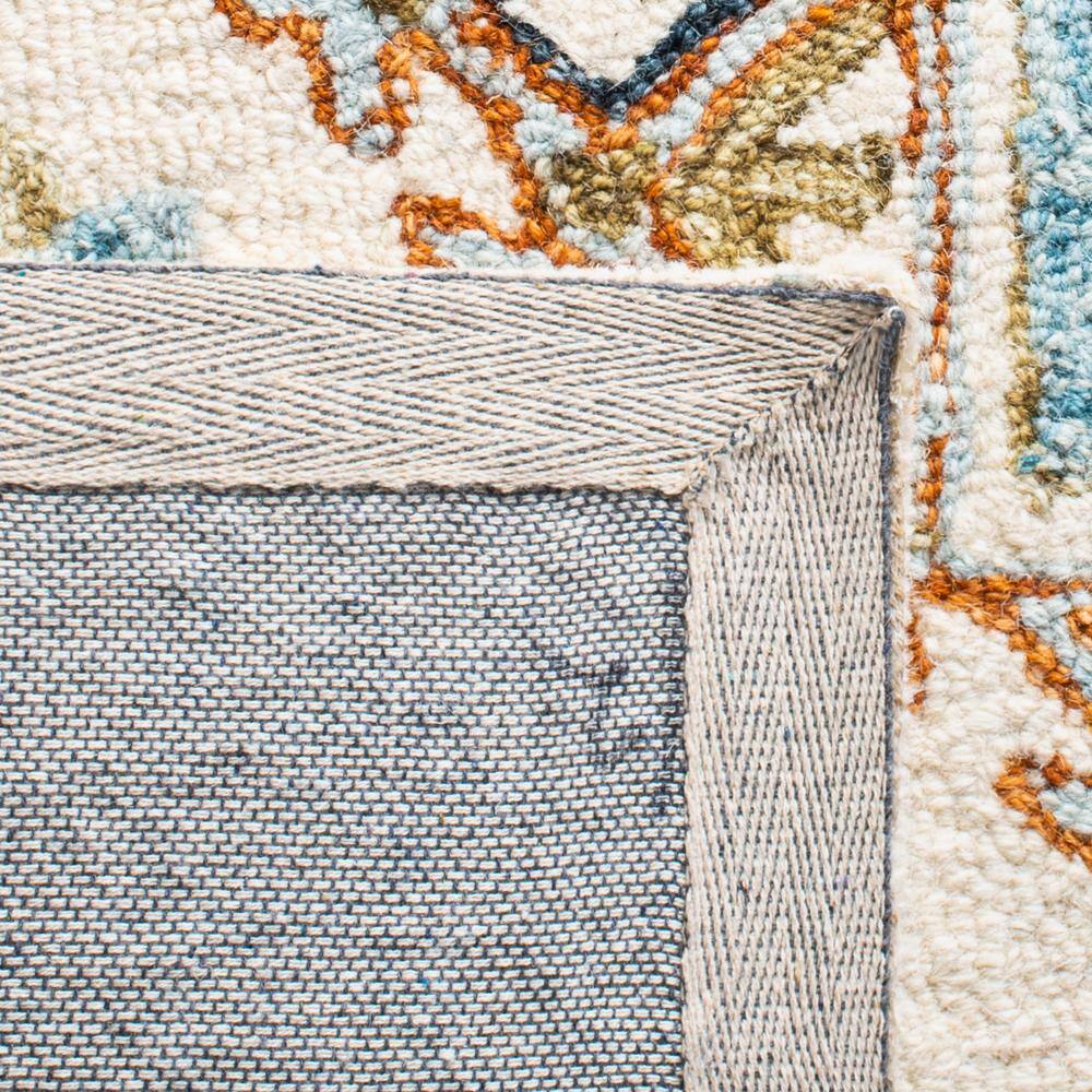 Ivory and Rust Medallion Wool 8' x 10' Handmade Tufted Rug