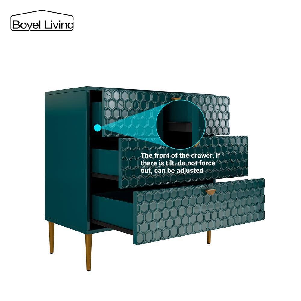 Detailed view of the drawer alignment and adjustment on the green chest.