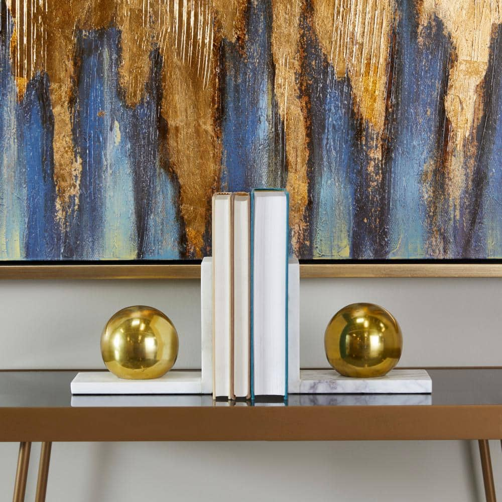 CosmoLiving by Cosmopolitan Gold Marble Orb Bookends (Set of 2