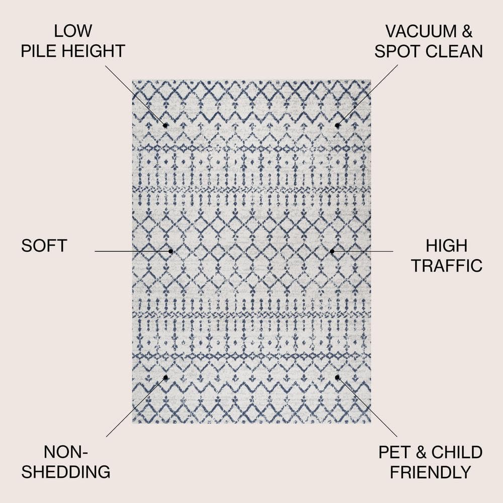 Ivory and Navy 4' x 6' Synthetic Trellis Area Rug