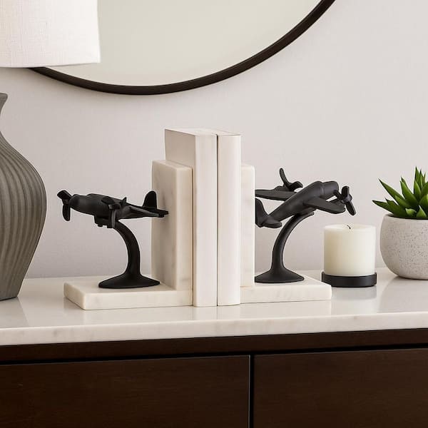 Liv & Skye Black 6 in. Metal Novelty Airplane Bookends On Marble (Set of 2)