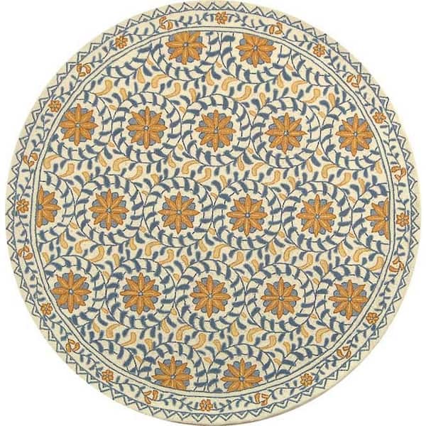SAFAVIEH Chelsea Ivory/Blue 8 ft. x 8 ft. Round Border Area Rug
