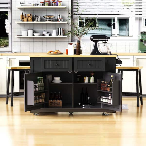 Zeus & Ruta Black Wood 48 in. Kitchen Island with Drop Leaf, Power Outlet, Internal Storage Rack