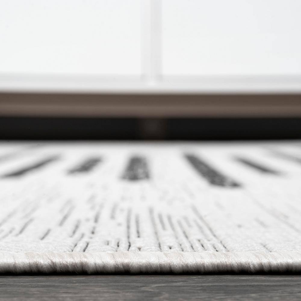 Ivory and Black Striped Synthetic 8' x 10' Reversible Rug