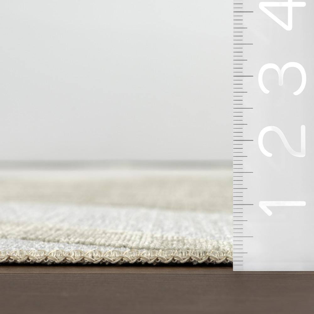 Sevyn Green and White Abstract Reversible 4' x 6' Area Rug