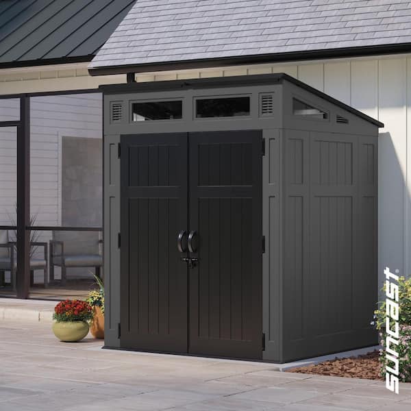 Modernist 6 ft. x 5 ft. Plastic Resin Storage Shed with Floor (36 sq. ft.) in Peppercorn (Gray) with Black Doors