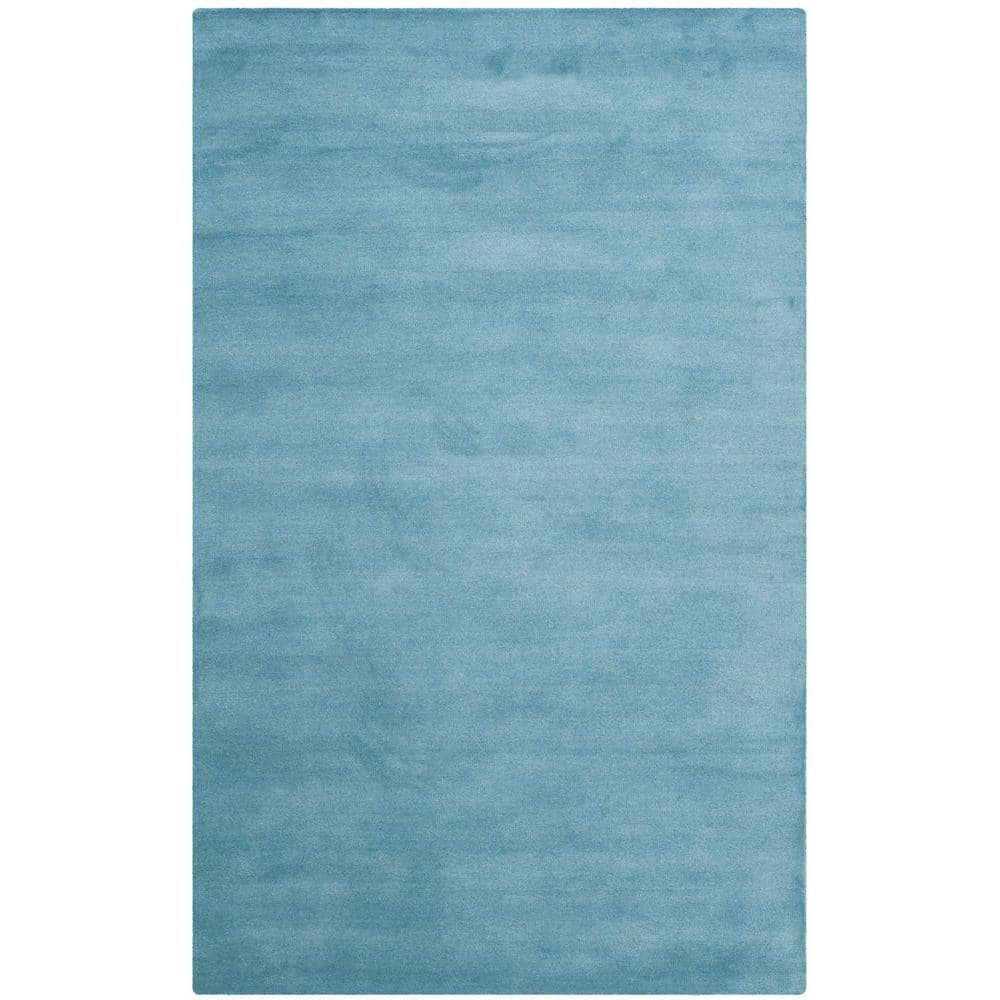 SAFAVIEH Himalaya Rachelle Solid Wool Area Rug  Blue  6  x 9 ( USED)