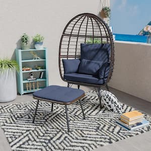 Oversized Outdoor Wicker Egg Chair with Blue Cushions and Footrest