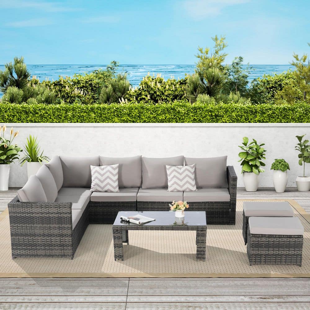 6-Piece Wicker Outdoor Sectional Set with Light Gray Cushions and Glass Tab