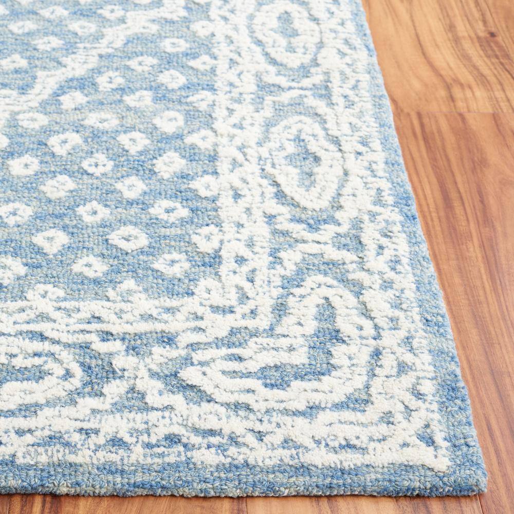 Ivory and Navy Tufted Handmade Wool Area Rug, 6' x 9'