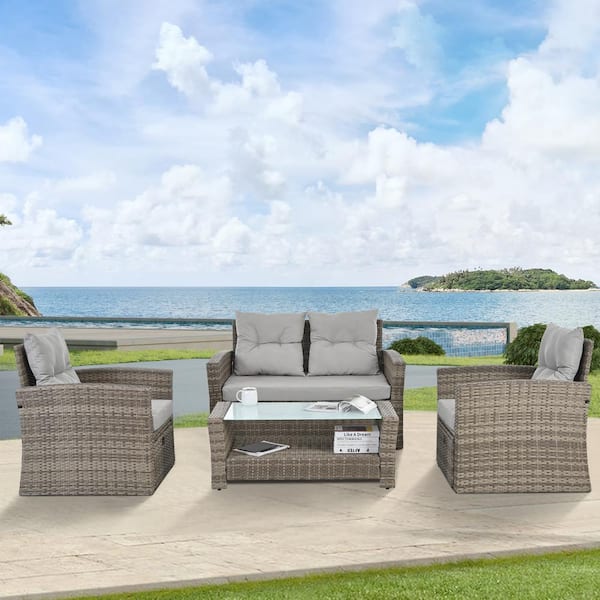 Zeus & Ruta 6-Piece Brown PE Wicker Outdoor Conversation Set with Dark Grey Cushions and Tempered Glass Coffee Table