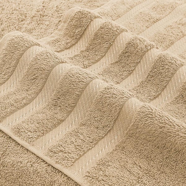 https://images.thdstatic.com/productImages/f0d1733b-26ce-455b-b919-89321e9ebbdf/svn/sand-taupe-american-soft-linen-bath-towels-edis4bathtaue125-c3_600.jpg