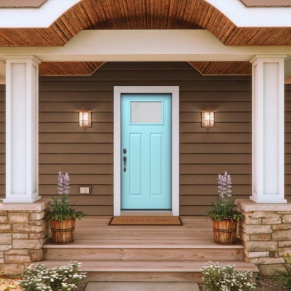 brown house with teal door