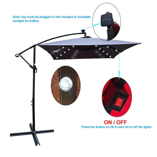 Sudzendf 10 ft. x 6.5 ft. Rectangular Solar Powered LED Lighted Market Patio Umbrella in Anthracite, with Crank and Cross Base Sudzendf 10 ft. x 6.5 ft. Rectangular Solar Powered LED Lighted Market Patio Umbrella in Anthracite, with Crank and Cross Base