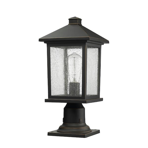 3-Light Oil Rubbed Bronze Outdoor Pier Mounted Fixture with Clear Seedy Glass Shade 3-Light Oil Rubbed Bronze Outdoor Pier Mounted Fixture with Clear Seedy Glass Shade