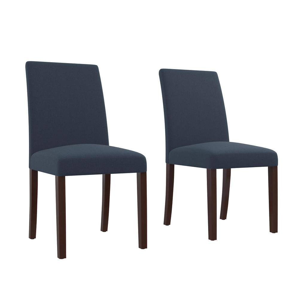 Two navy blue linen upholstered dining chairs with dark wood legs.