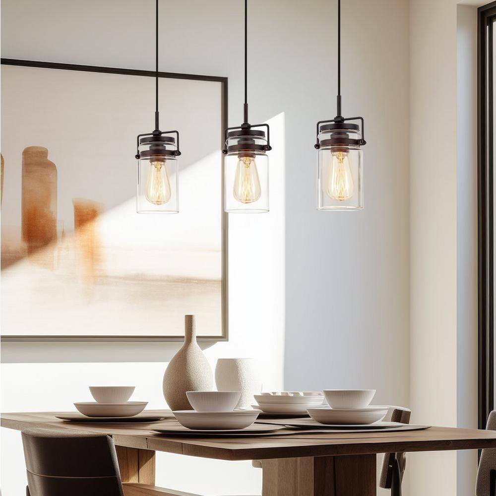 Wyer 8" Bronze Industrial Pendant Light with Clear Glass Shade