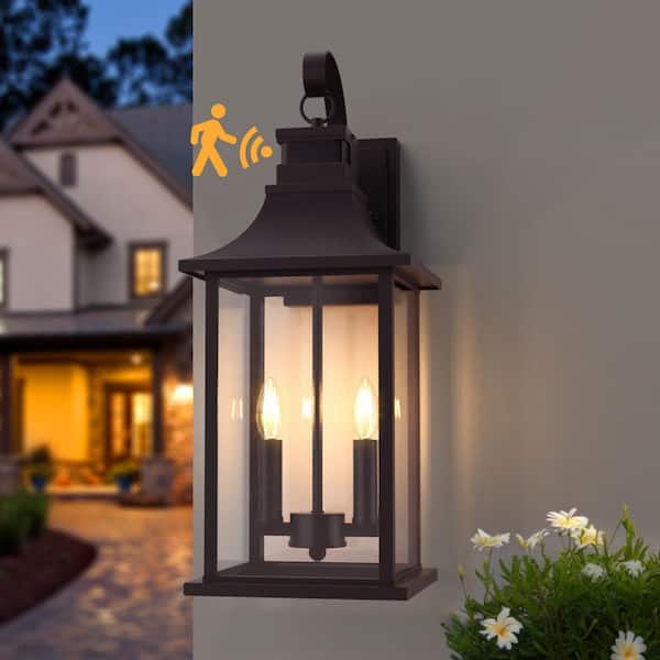 Decorators 19.5 in. 2-Light Bronze Aluminum Hardwired Dust to Dawn and Motion Sensor Outdoor Sconce No Bulbs Included
