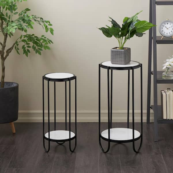 Litton Lane Large Black Metal Geometric Curved Rod Plantstand with Marble Tabletops (Set of 2)