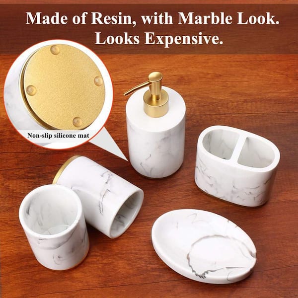 https://images.thdstatic.com/productImages/f12691b1-36bd-4176-9d93-fa12616b14b2/svn/ink-white-with-gold-bathroom-accessory-sets-b085xwx1dz-c3_600.jpg