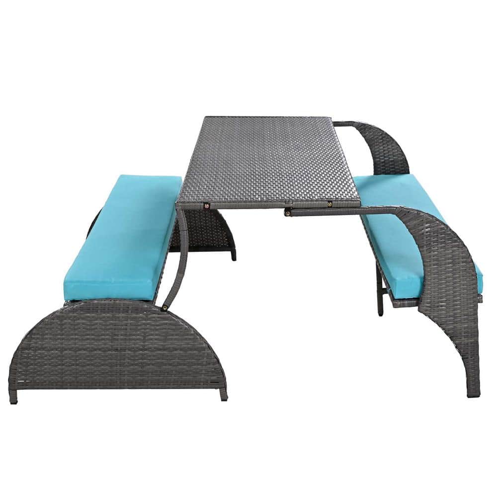 Close-up of the wicker outdoor dining table and bench set.