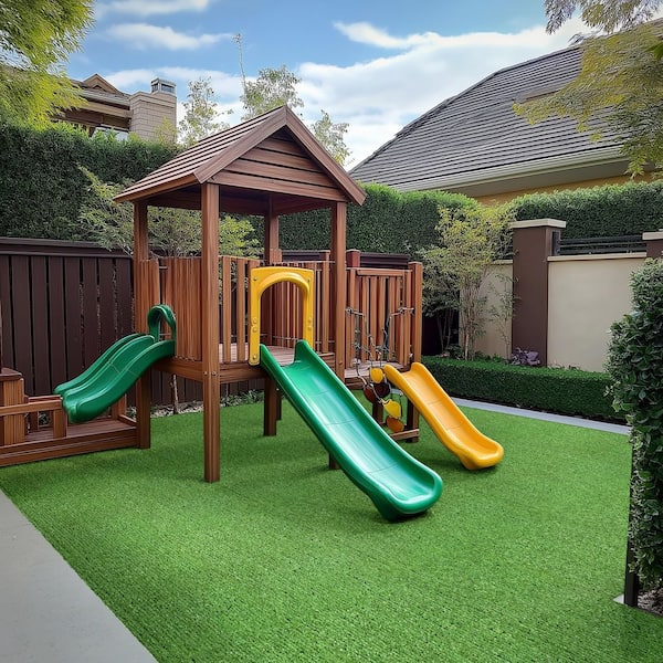 TrafficMaster Mainstream 6 ft. Wide x Cut to Length Emerald Green Artificial Grass Turf LHDTRFRMGRE6100