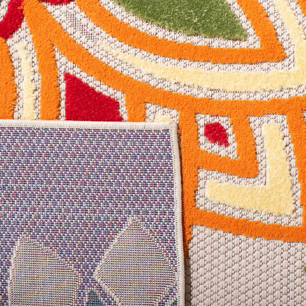 Ivory and Orange Floral Synthetic 8' x 10' Reversible Rug