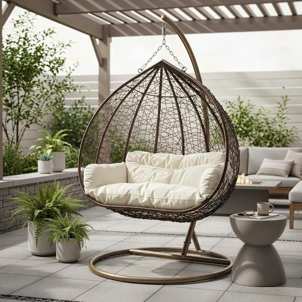 Hanging Metal Porch Swing Chair in Brown Stainless Steel Frame with Cushions Recluse Collection in Beige