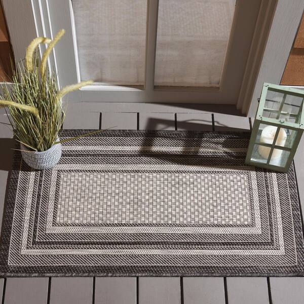 Courtyard Light Gray/Black 2 ft. x 4 ft. Solid Color Striped Indoor/Outdoor Area Rug
