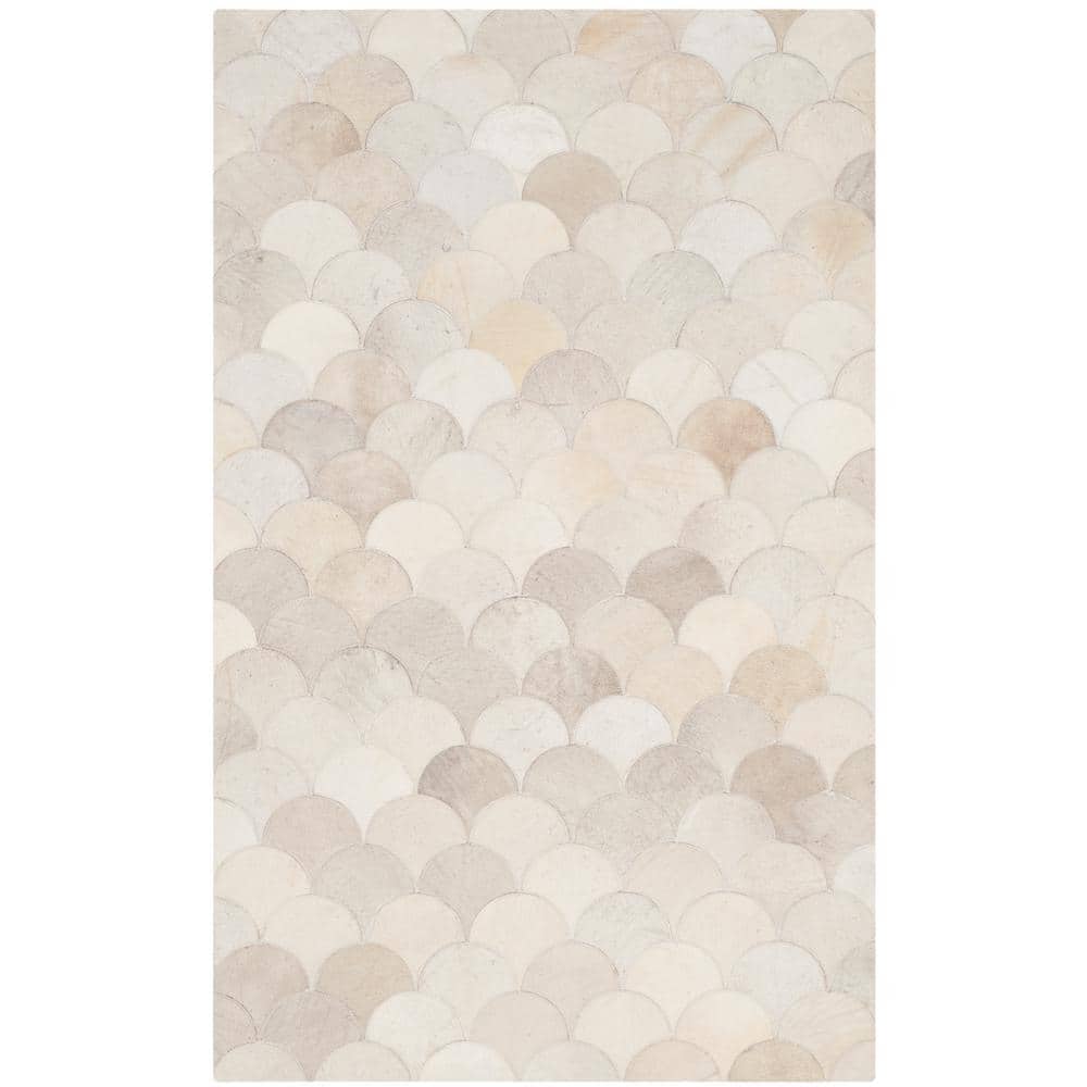 Ivory Geometric Handmade Cowhide Area Rug