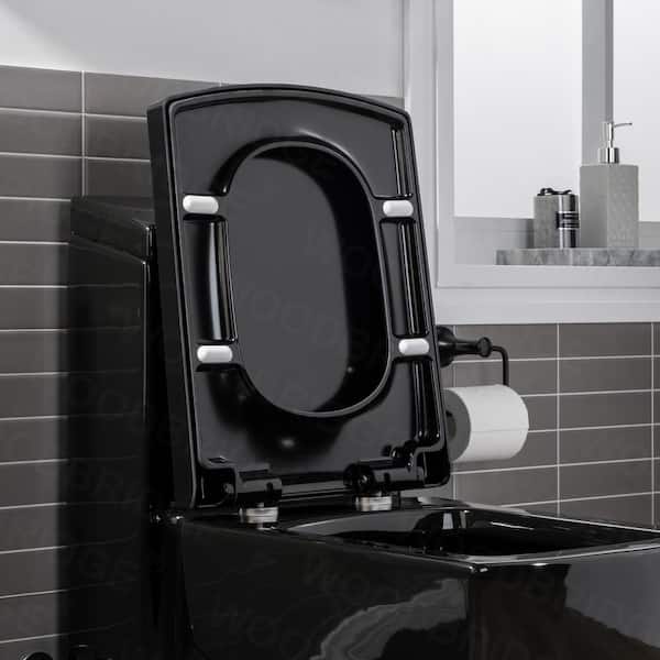 https://images.thdstatic.com/productImages/f1c67a5d-d8df-4559-89f2-28cd07705fb3/svn/black-with-chrome-button-woodbridge-one-piece-toilets-b0921-1f_600.jpg