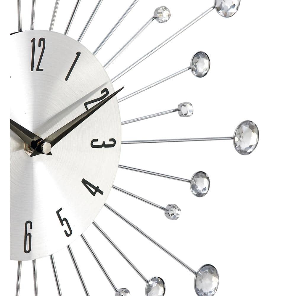 Silver Metal Starburst Wall Clock with Crystal Accents