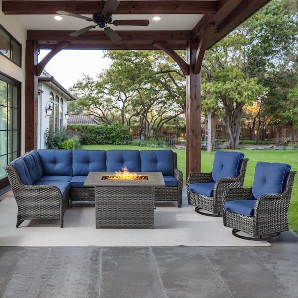 Gray 4-Piece Wicker Patio Fire Pit Set, Outdoor Sectional Seating Set with Olefin Navy Blue Cushions and Swivel Rockers