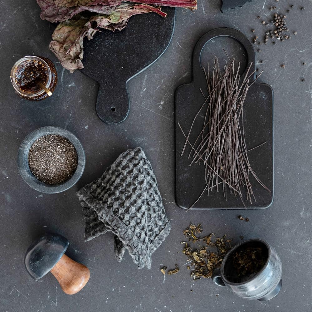 Black Mango Wood Cutting Board with Round Handle
