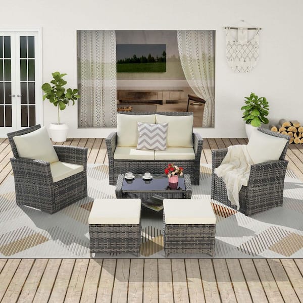 Zeus & Ruta 6-Piece Wicker Patio Furniture Sets with Beige Cushions Ottoman and Tempered Glass Coffee Table