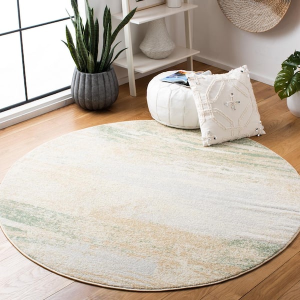 Adirondack 6 ft. x 6 ft. Ivory/Gold Solid Color Distressed Round Area Rug