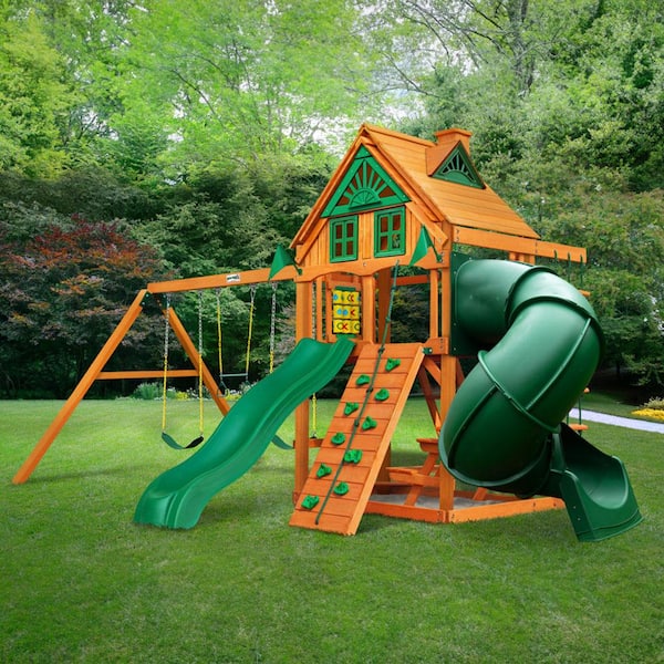 Gorilla Playsets Mountaineer Treehouse Wooden Outdoor Playset with Tube Slide, Rock Wall, Swings, and Backyard Swing Set Accessories