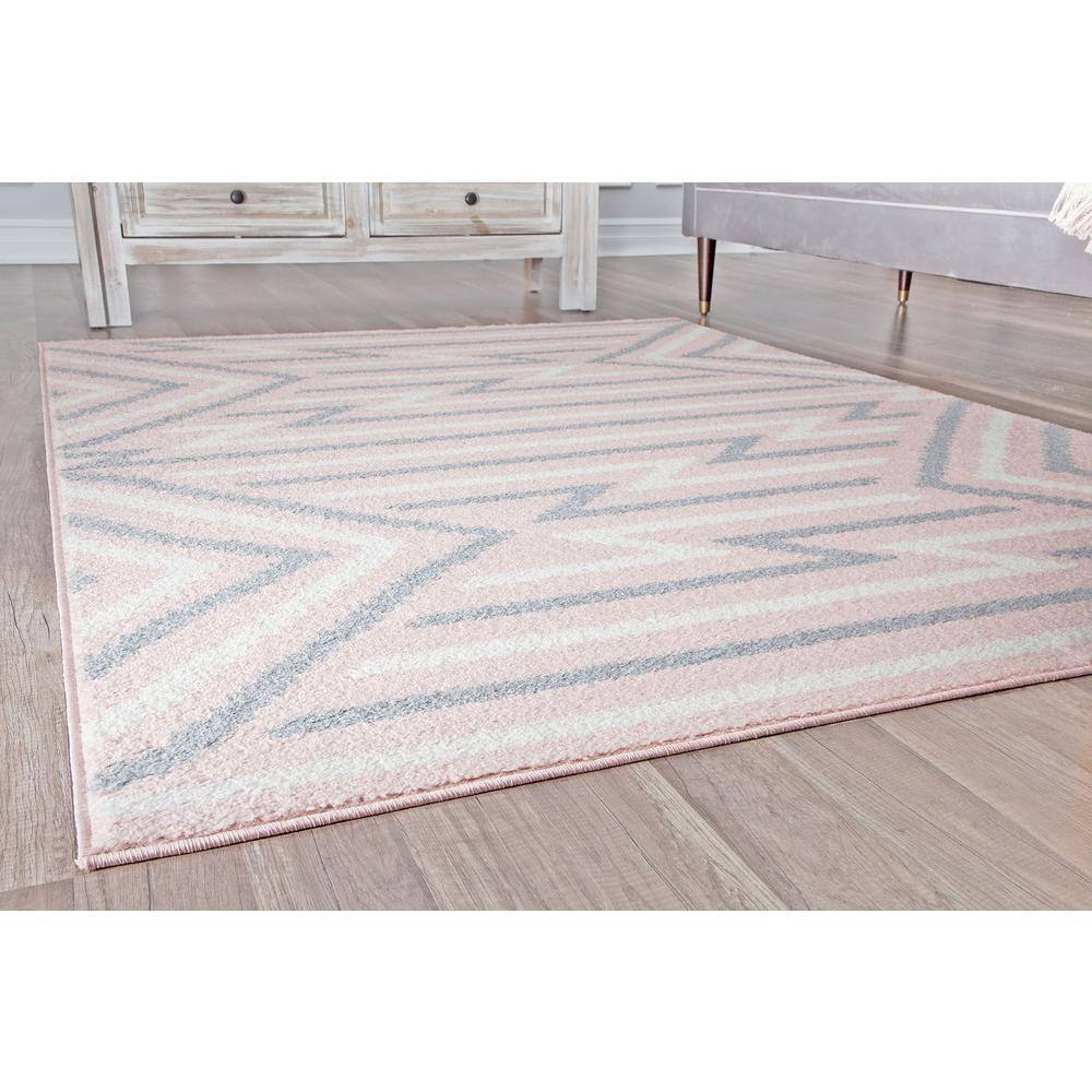 6' x 9' Gray and Pink Geometric Synthetic Area Rug