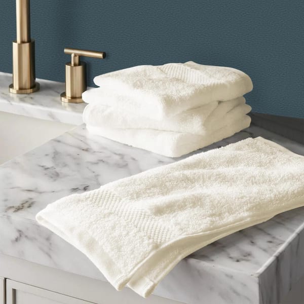 https://images.thdstatic.com/productImages/f2792387-1e5c-4087-9022-e4077b2bca39/svn/ivory-delara-bath-towels-a1hcwtset-60ivy-e1_600.jpg